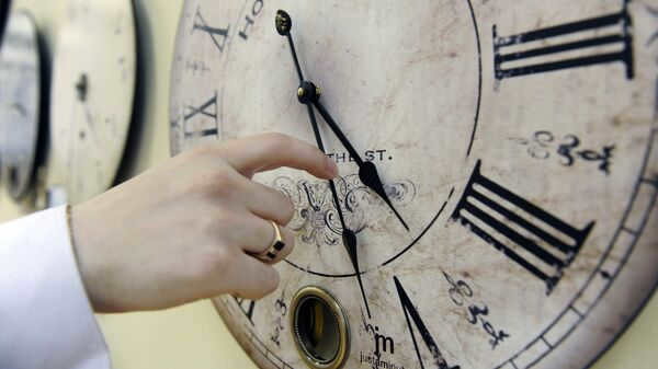 Switching hands on the clock, archival photo
