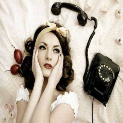 How did people used to tell the time on the telephone?