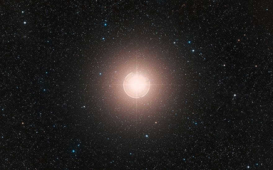The image shows the color composition by Digitized Sky Survey 2. The field of view covers 2 x 1.5 degrees