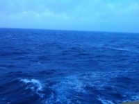 A photo of the open sea, from aboard a ship.