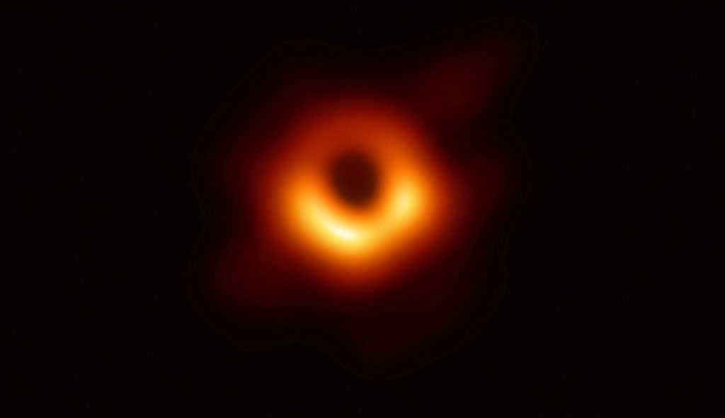 The first photo of a black hole taken in 2019. It shows the supermassive black hole of the M87 galaxy