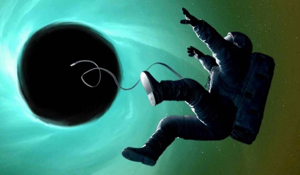 Image of an astronaut being pulled into a black hole