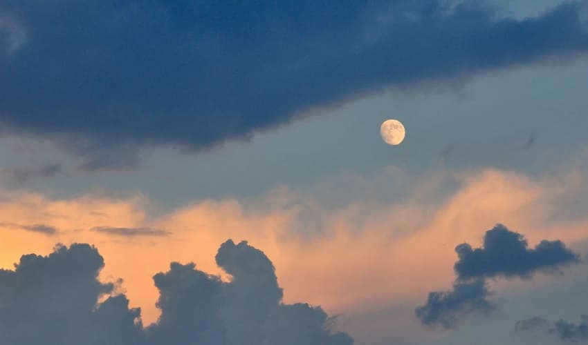What is the difference between a planet and a moon?