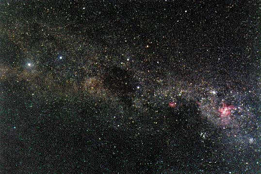 SOUTH PART of the Milky Way from the bright emission nebula h of Kiel (right) through the Southern Cross (right of center) and the dark Coal Sack Nebula (center) to b and a of Centaurus (left).
