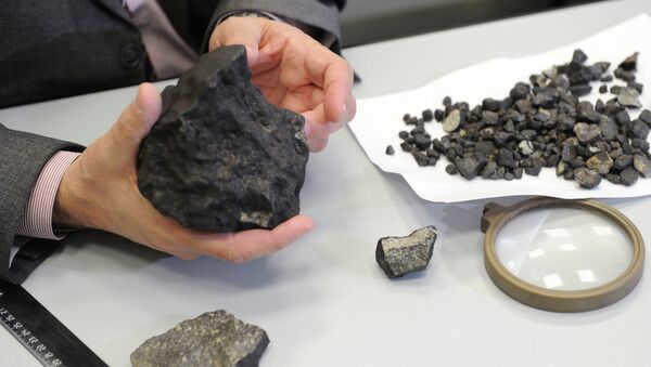 Study of meteorite fragments found in the Chelyabinsk region. Archive photo
