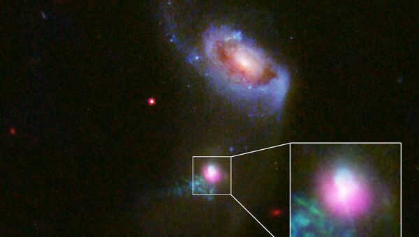 A supermassive black hole in the center of the SDSS J1354 + 1327 galaxy spits out gas falling on it twice