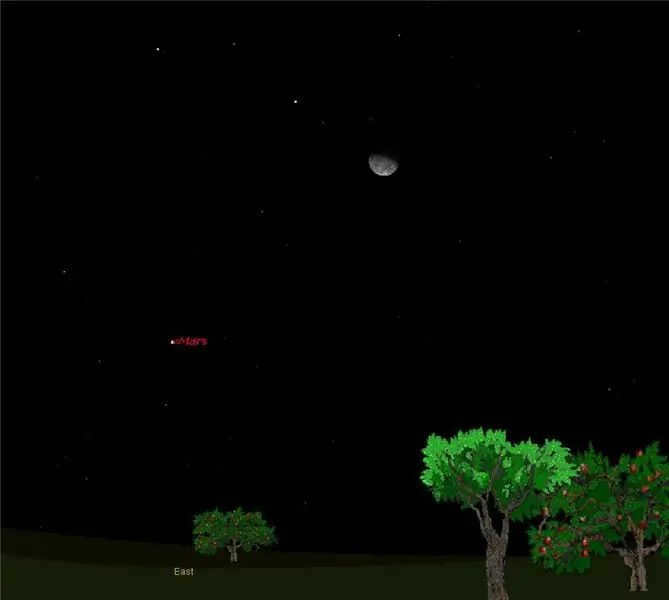 Mars and the moon dance in the night sky