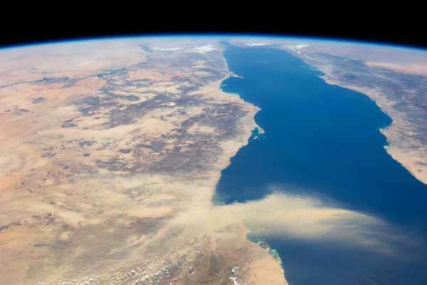 Dust plume stretching from the Egyptian desert to the Red Sea