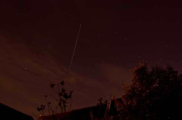 Flight against the background of the Big Dipper constellation
