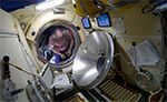 Opening the Progress cargo hatch