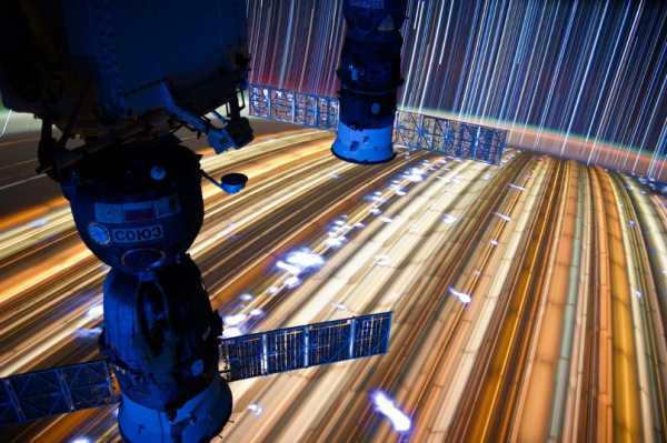 Soyuz series spaceships against the background of the Earth