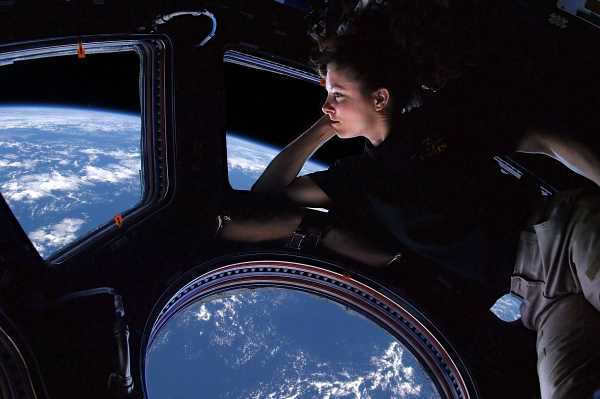 Astronaut Tracy Caldwell Dyson looks at the Earth.