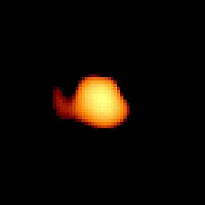 The flow of matter to the white dwarf star, which is not visible due to its low luminosity.