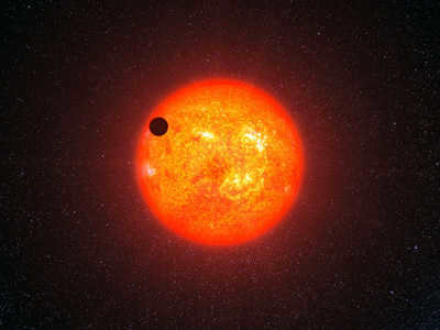 a planet in the background of a red dwarf