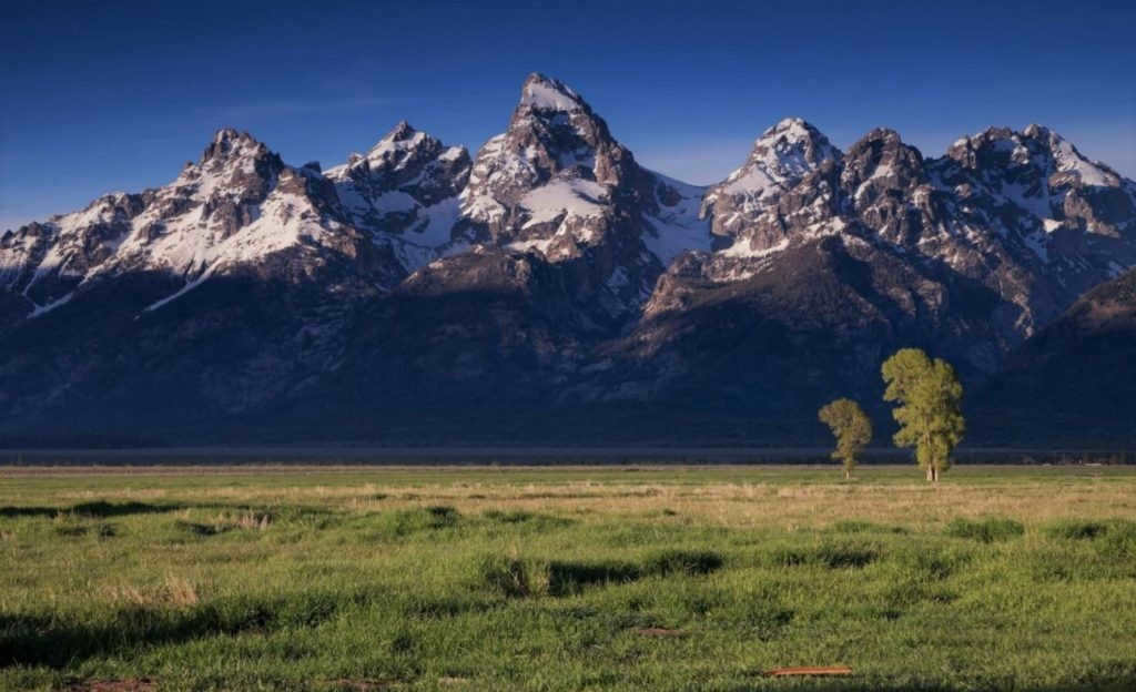 A picture of a plain and mountains in one photo