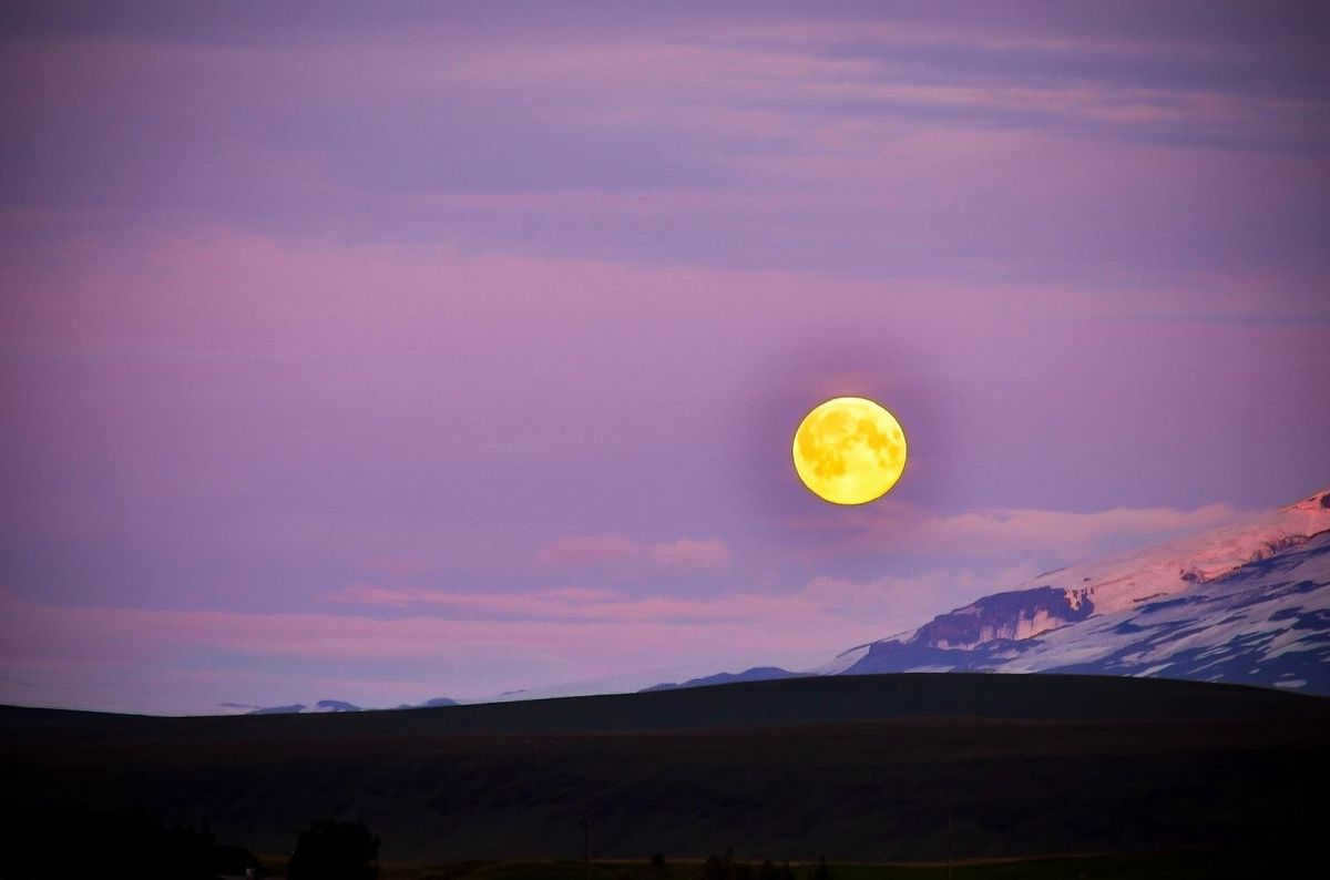 Sunset between the sun and the moon