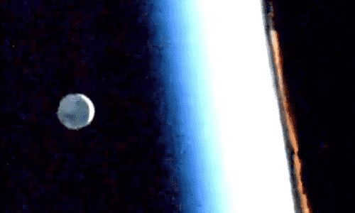The Moon near the horizon during sunrise