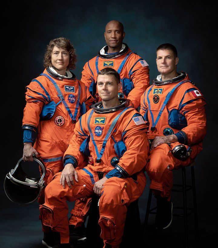 NASA's Artemis 2 mission team (left to right): NASA astronauts Christina Hammock Couch, Reid Wiseman (seated), Victor Glover and Canadian Space Agency astronaut Jeremy Hansen.