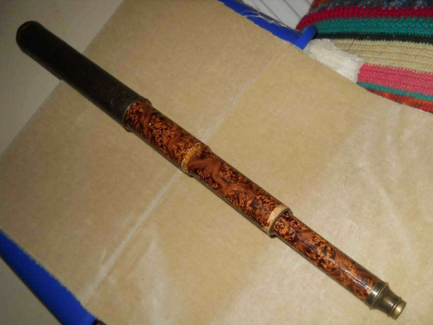 Galileo's telescope with a handwritten inscription indicating the magnifying power of the lens