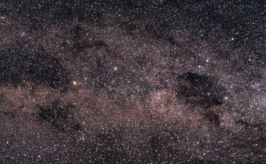 The image shows the area around the Southern Cross with Alpha Centauri, a bright yellow star (middle left).