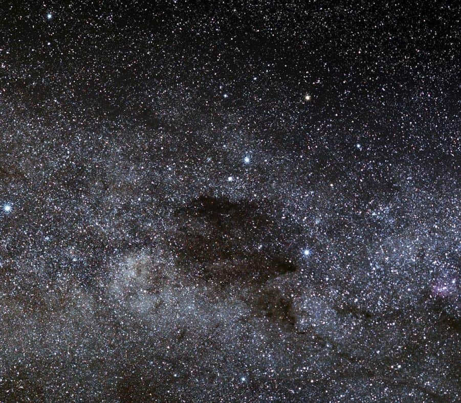 The Coal Sack Nebula is 600 light-years away. This dark plane is an opaque interstellar dust cloud that obscures the light of the stars in the Milky Way. Among Europeans, it was first noticed by Spanish navigator and explorer Vincente Yanez Pinzon, who sailed to the South American coast in 1499. In the 16th century, it was called the Black Magellanic Cloud. The Incas believed that the god Ataguchu struck the Milky Way in anger and a piece just broke off. This section became the Small Magellanic Cloud, and the previous site left a trace of the impact - a black charcoal mark. Another interesting object is the Southern Cross. This cross-shaped constellation gained great importance in the cultures of the southern hemisphere even in prehistoric times. Even now it is still recalled on the flags of Australia, Brazil, New Zealand, Papua New Guinea and Samoa. The European Southern Observatory (ESO) also recognized the importance of the Southern Cross as the foremost constellation of the southern heavens and added the cross-shaped symbol to the ESO emblem.