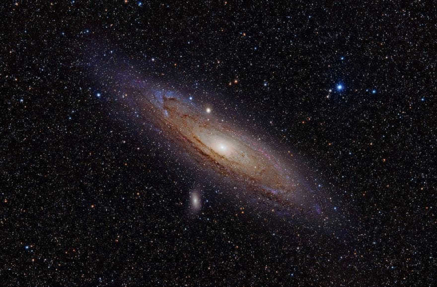 In front of you is the Andromeda spiral galaxy, 2.5 million light-years distant. M32, M110, and the star Nu Andromeda are also noted here. The image was taken with an alpha hydrogen filter