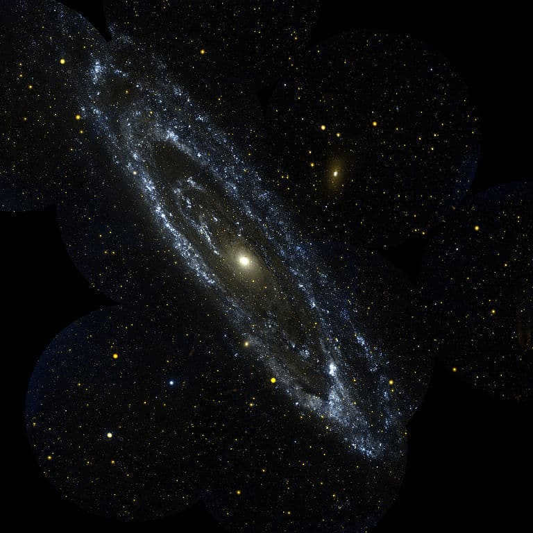 In the Herschel Observatory image, beautiful ring-shaped dust swirls can be seen. The glow is created by the long-wavelength or far-infrared spectrum, which allows the coolest dust to be examined. Wavelengths are as long as 250-500 microns. You can see dust clouds with such precision when the temperature is only a couple dozen degrees above absolute zero. They look dark and opaque. Dust spokes stand out between the concentric rings. The colors have been improved on purpose to make the view more comfortable. The colder the cloud, the brighter it is (red), but warmer ones have a blue tint. If we add other data, we understand that the infrared color is affected not only by temperature.