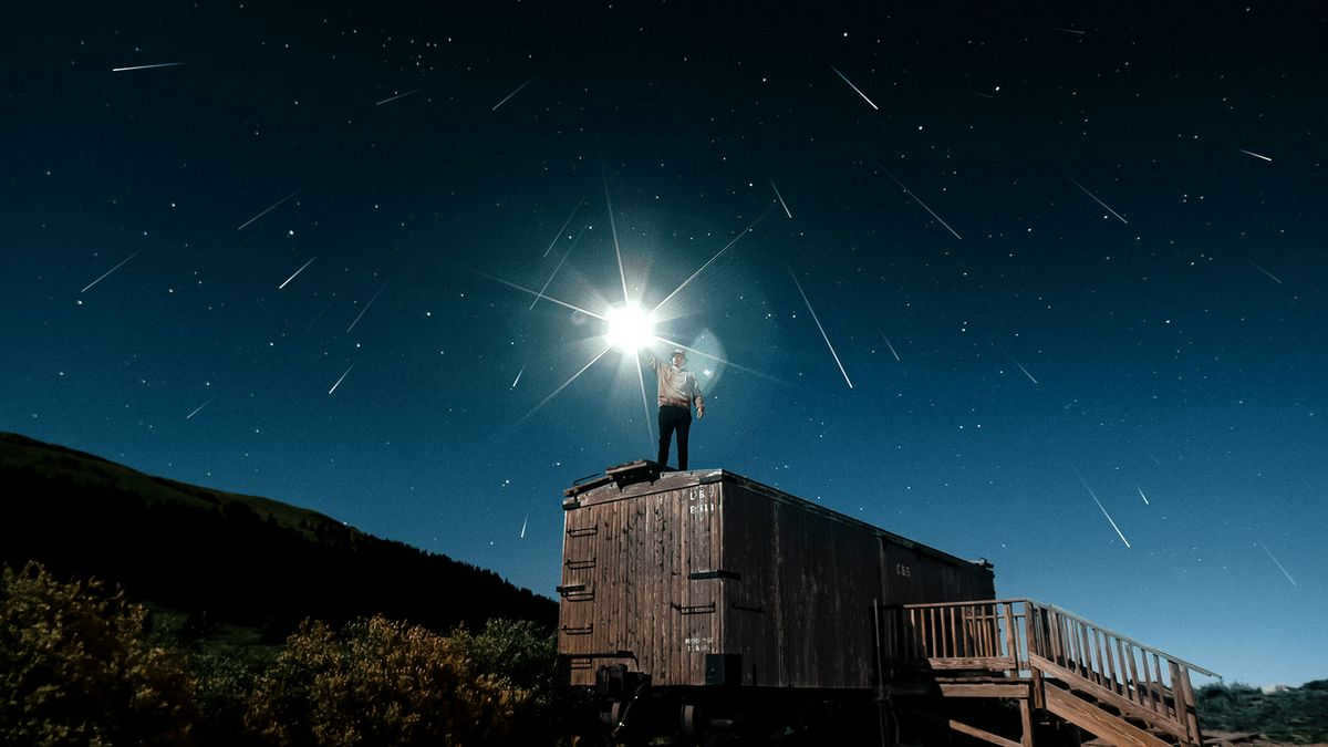 A man watching a meteor shower
