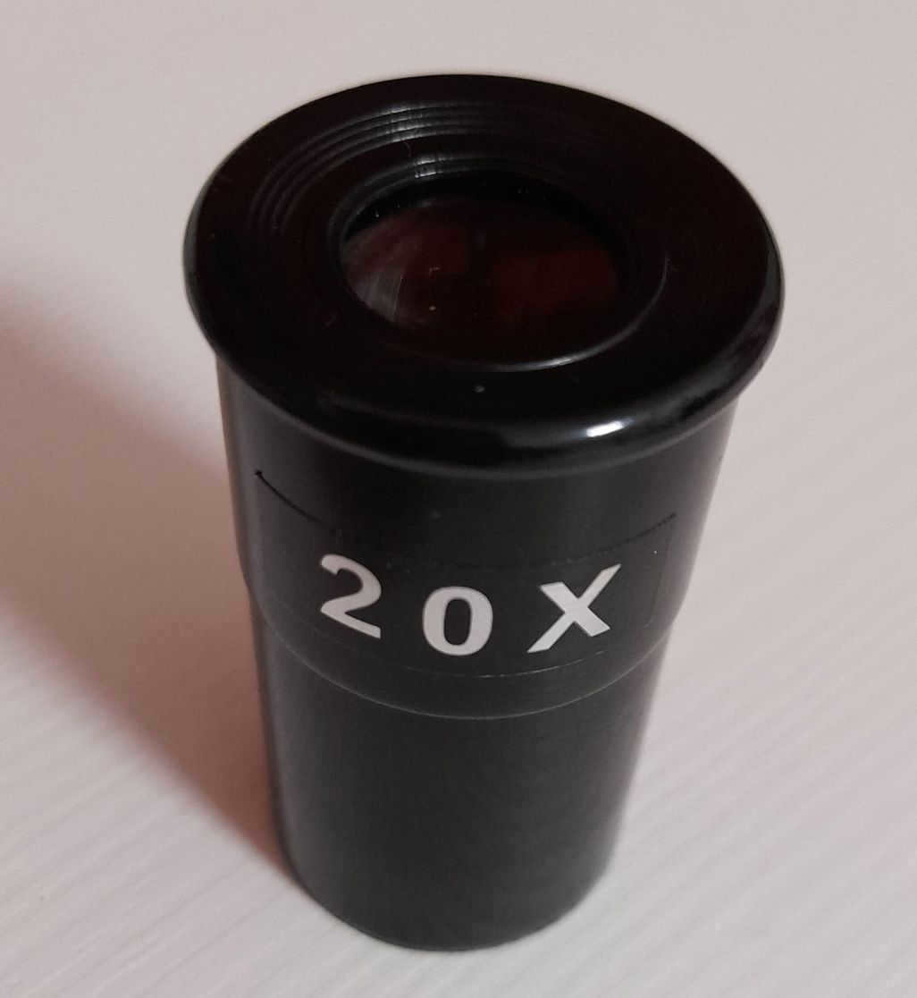 This eyepiece became a transitional link from a homemade astrocamera to the optical system of a telescope. Once upon a time it was included in a set with a children's telescope, and therefore it was made with the expected quality. Its value lay solely in the fit size, which was suitable for use in the Levenguc. The lenses, of course, had to be removed