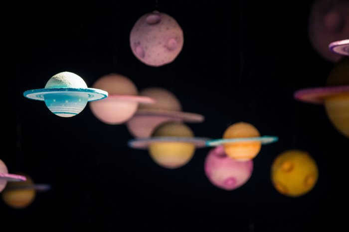 How have scientists determined the mass of Earth and other planets?