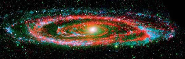 Peeking at our neighbor. Our nearest neighbor, the Andromeda Galaxy (M31), is one of the favorite celestial objects for amateur astronomical observations and photography. And not just amateur - the illustration shows a combined multispectral view of M31 taken by the Spitzer Space Telescope and NASA's Galaxy Evolution Explorer (GALEX). GALEX's UV eyes reveal Andromeda's fiery nature - hot regions filled with young (shown in blue) and old (green dots and a bright yellow region in the galaxy's center) stars. Spitzer's sensitive infrared telescope sees the other, cooler side - regions of star formation (shown in red) hidden from view by clouds of dust and gas. Shown in purple are regions where hot massive stars coexist with cooler ones surrounded by dust clouds. Image: Popular Mechanics