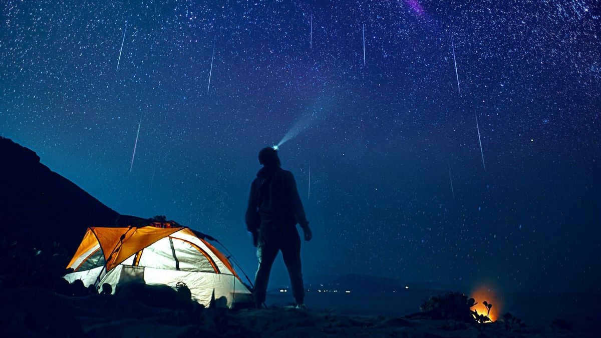 A man watching a meteor shower