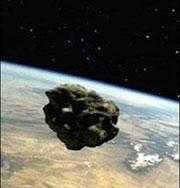 Meteorite on the background of the Earth's surface