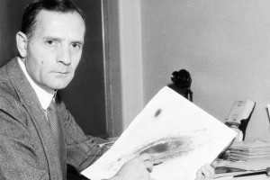 E.P. Hubble with an image of the Andromeda galaxy in hand