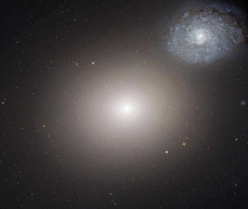 Galaxy M 60 and its companion spiral galaxy NGC 4647.