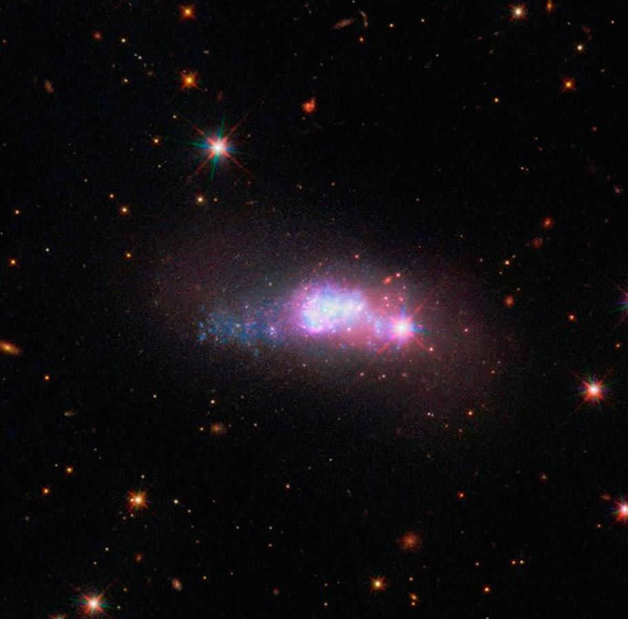 Blue dwarf galaxy ESO 338-4 - an irregular galaxy