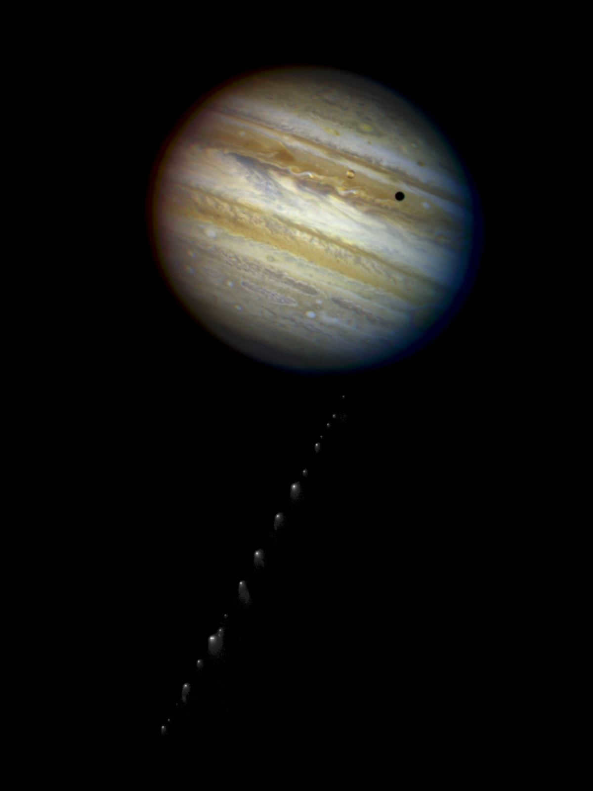 A composite image of Jupiter and comet Shoemaker-Levy 9.