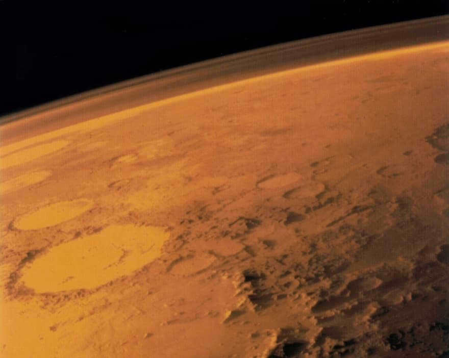 The thin Martian atmosphere and dusty red surface imaged by the Viking 1 lander in 1976.