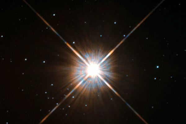 Which star and galaxy is closest to Earth