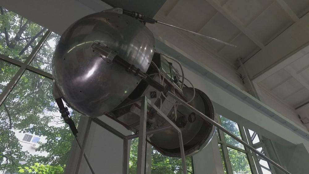 When and by whom was the first artificial earth satellite launched?