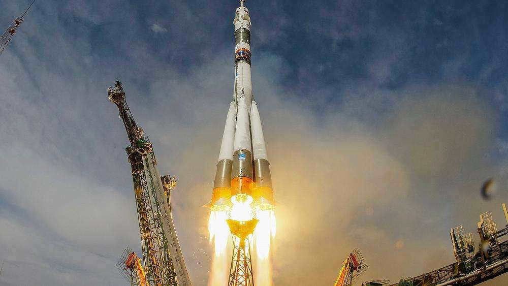 When and by whom was the first artificial earth satellite launched?