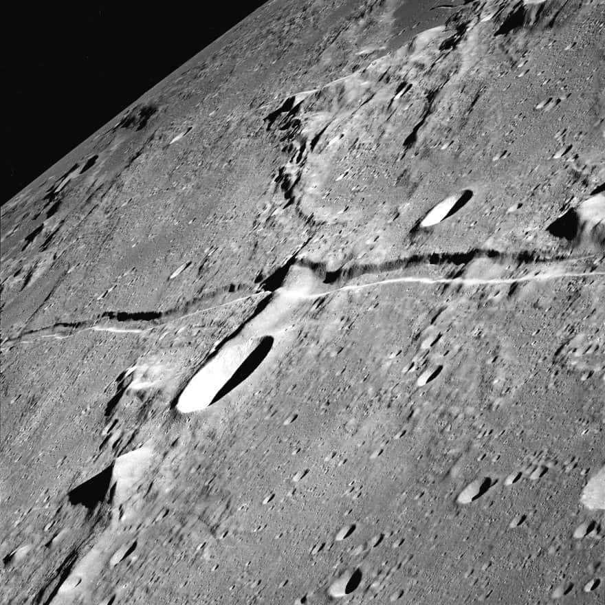 The Ariadeus furrow, captured by the Apollo 10 mission. The dark area on the upper right is half of Boscovich crater