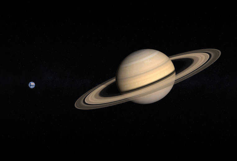 Earth and the planet Saturn