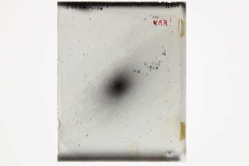On October 5, 1923, astronomer Edwin Hubble imaged the Andromeda Nebula with the Hooker Telescope at Mount Wilson Observatory near Los Angeles. At first he was excited, believing he had recorded a new, exploding star. He labeled the star, which lies between the two marks he drew at the top right on the plate, with the letter N. The star turned out to be a Cepheid variable, and Hubble used it to prove that the distance to the Andromeda Galaxy was much greater than astronomers thought (photo: provided by Carnegie Observatories / Cindy Hunt)