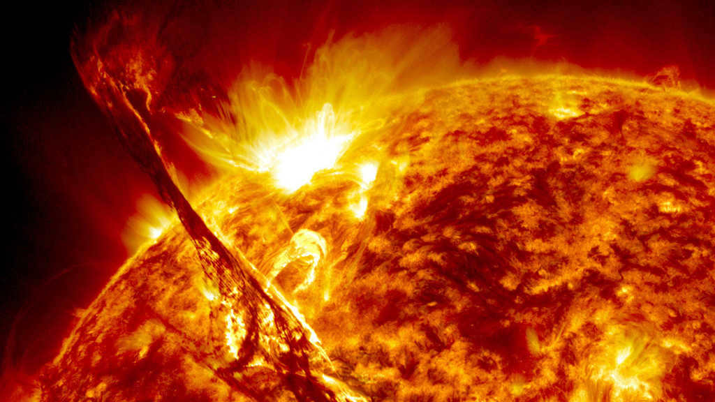 Spots, flares and prominences