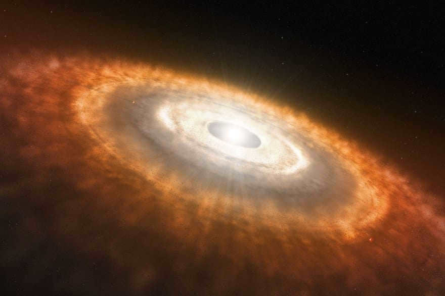 An artistic interpretation of the early solar system, where collisions between particles in the accretion disk led to the formation of planets