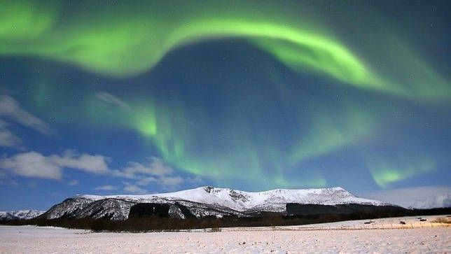 Northern Lights occur when solar particles collide with the density of Earth's atmosphere.