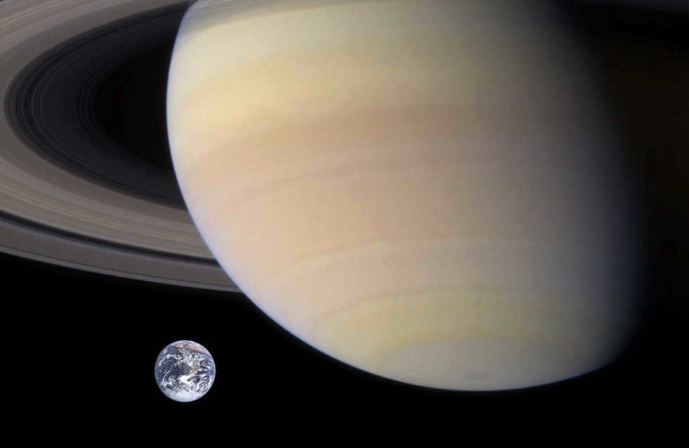 A visual comparison of the size of Saturn and Earth