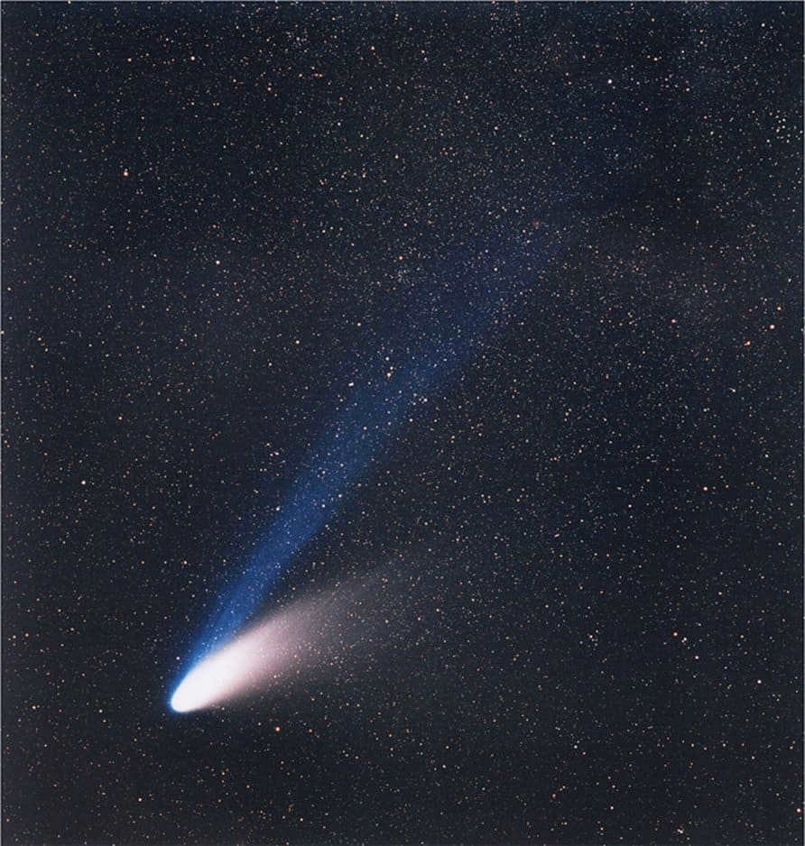 Comet C/1995 O1 shines in the night sky in 1997. Such long-term comets are considered a major threat to our planet