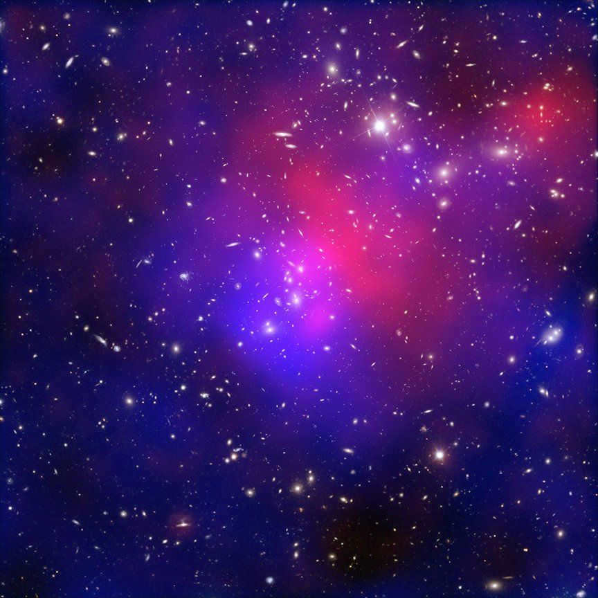 NASA's X-ray laboratory has captured the collision of at least four galaxy clusters. The suspected dark matter is highlighted in blue. 